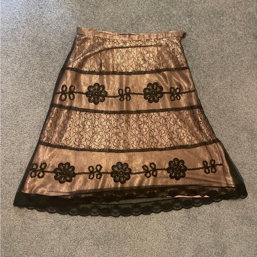 Chic Light Pink Skirt with Black Lace Detail